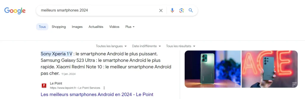 Capture d'écran de la barre de recherche Google avec la requête 'meilleur smartphone 2024', illustrant une intention de recherche commerciale.