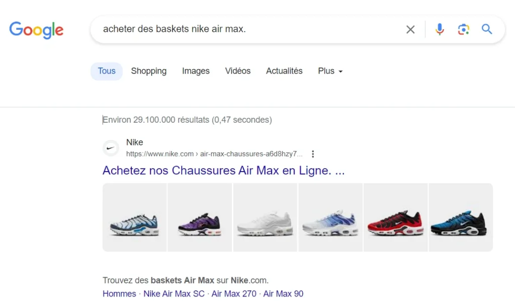 Recherche transactionnelle sur Google : 'Acheter des baskets Nike Air Max' dans la barre de recherche, illustrant une intention d'achat des baskets Nike.